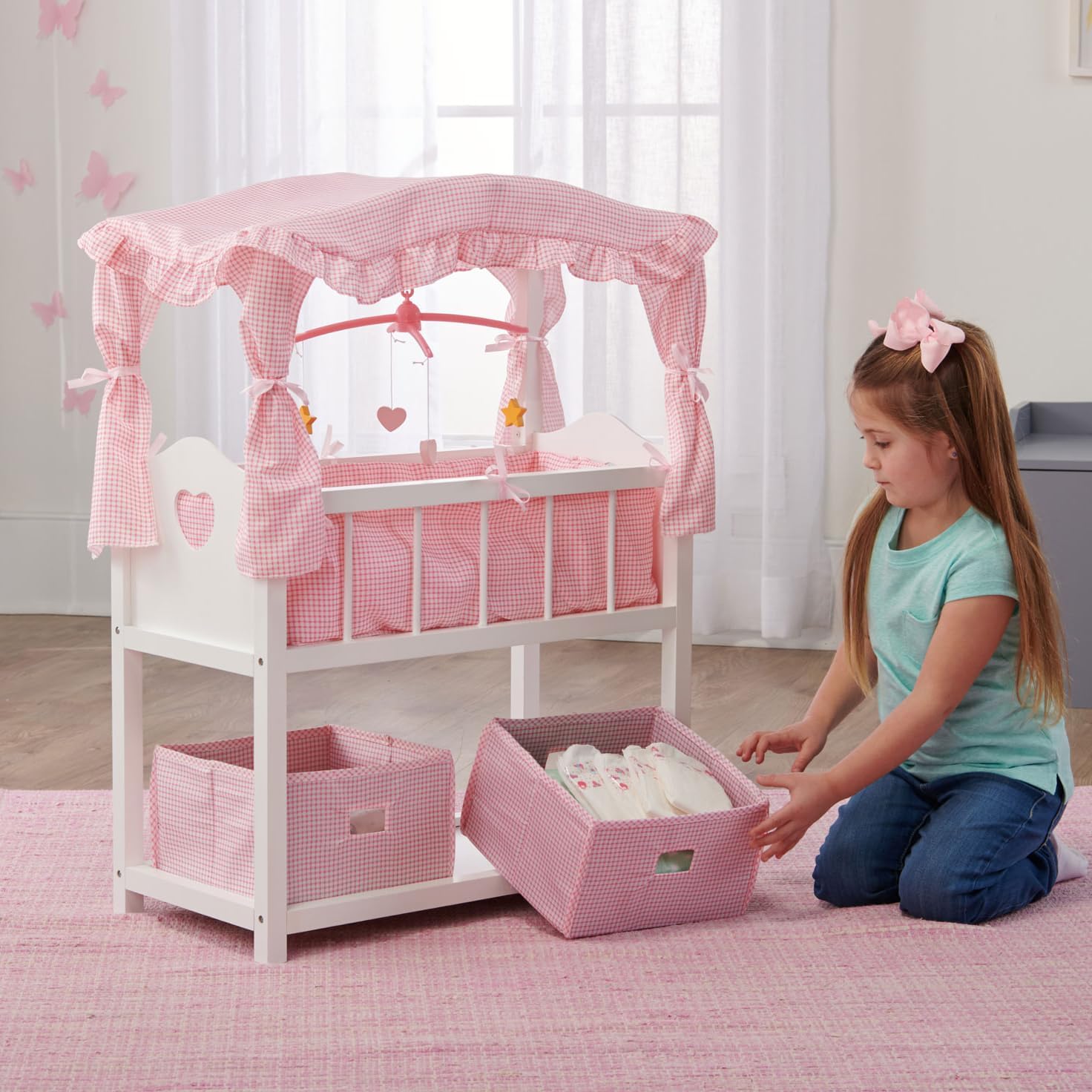Badger Basket Toy Doll Bed with Storage Baskets and Musical Mobile, White/Pink R614082